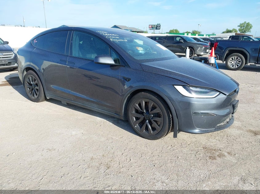 2023 Tesla Model x VIN 7SAXCAE54PF386680 — IAAI salvage auction photo