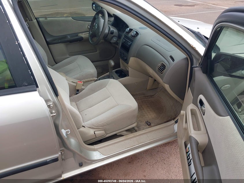2003 Mazda Protege VIN JM1BJ225330143605 IAAI salvage auction — NORMAL WEAR, Clear (Hawaii), sold $25 on 2026-07-21 (photo 5)