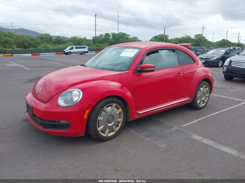2012 Volkswagen Beetle VIN 3VWJP7ATXCM645920 IAAI salvage auction — NORMAL WEAR, Clear (Hawaii), sold $100 on 2026-07-21 (photo 2)