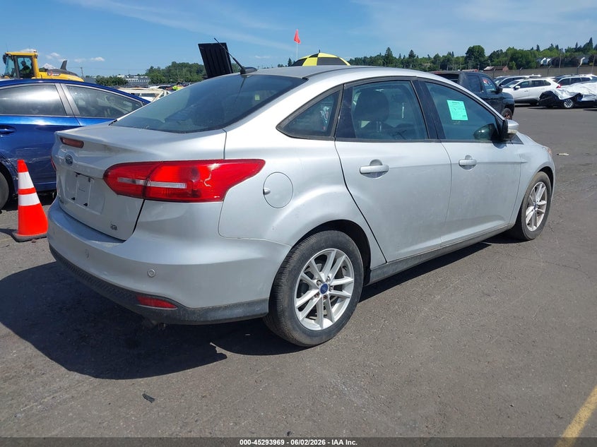2015 Ford Focus VIN 1FADP3F28FL370133 IAAI salvage auction — FRONT & REAR, Salvage (Oregon), sold $525 on 2026-07-09 (photo 4)