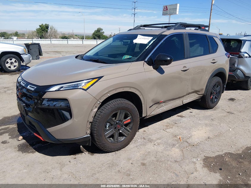 2026 Nissan Rogue VIN 5N1BT3BB6TC681621 IAAI salvage auction — SIDE, Salvage (New Mexico), sold $12,800 on 2026-07-29 (photo 2)
