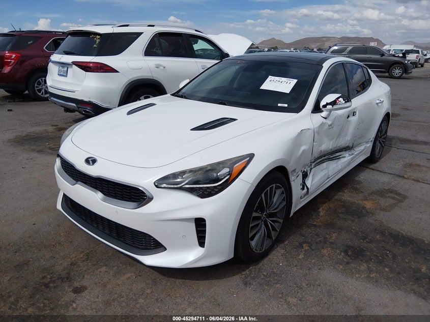 2018 Kia Stinger VIN KNAE25LA0J6034310 IAAI salvage auction — SIDE, Salvage (New Mexico), sold $7,100 on 2026-07-22 (photo 2)