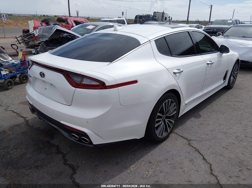 2018 Kia Stinger VIN KNAE25LA0J6034310 IAAI salvage auction — SIDE, Salvage (New Mexico), sold $7,100 on 2026-07-22 (photo 4)