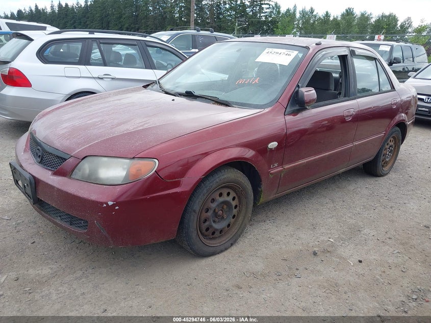 2002 Mazda Protege VIN JM1BJ225621617488 IAAI salvage auction — NORMAL WEAR, Clear (Washington), sold $275 on 2026-07-22 (photo 2)