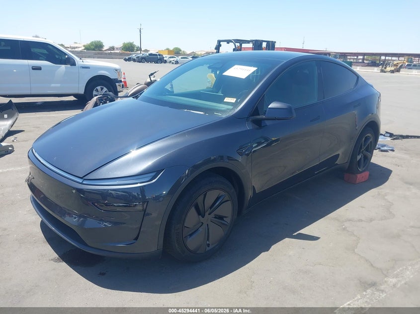 2026 Tesla Model y VIN 7SAYGDED0TF638288 IAAI salvage auction — RIGHT REAR, Salvage (Arizona), sold $15,450 on 2026-07-28 (photo 2)