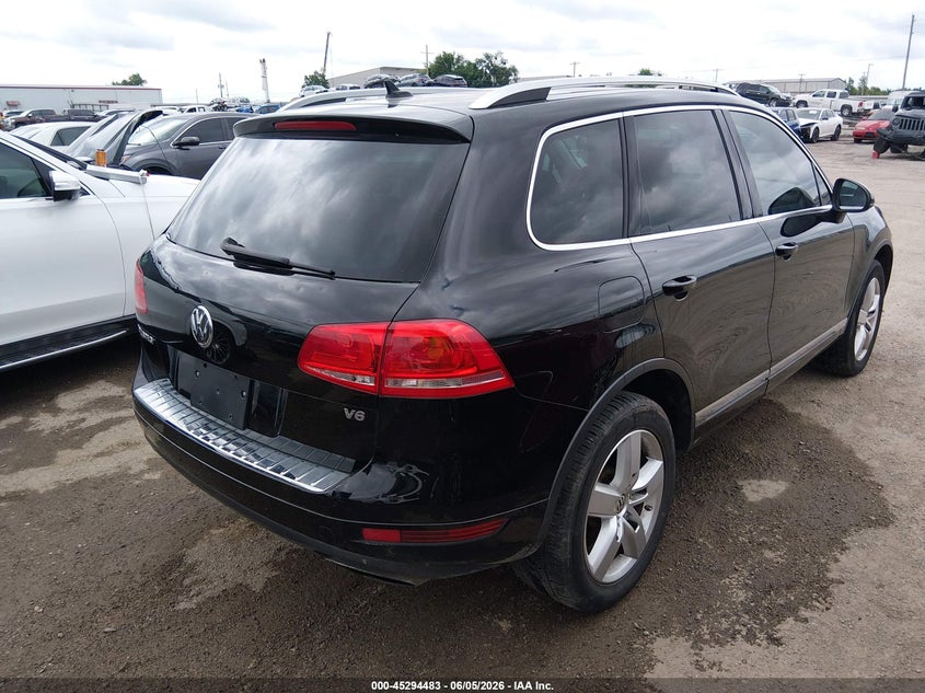 2012 Volkswagen Touareg VIN WVGEF9BP4CD006301 IAAI salvage auction — HAIL, Clear (Oklahoma), sold $2,200 on 2026-08-04 (photo 4)