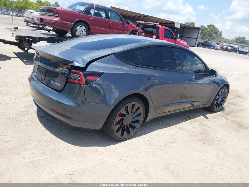 2023 Tesla Model 3 VIN 5YJ3E1EC5PF408481 IAAI salvage auction — REAR END, Salvage (Tennessee), sold $13,200 on 2026-07-08 (photo 4)