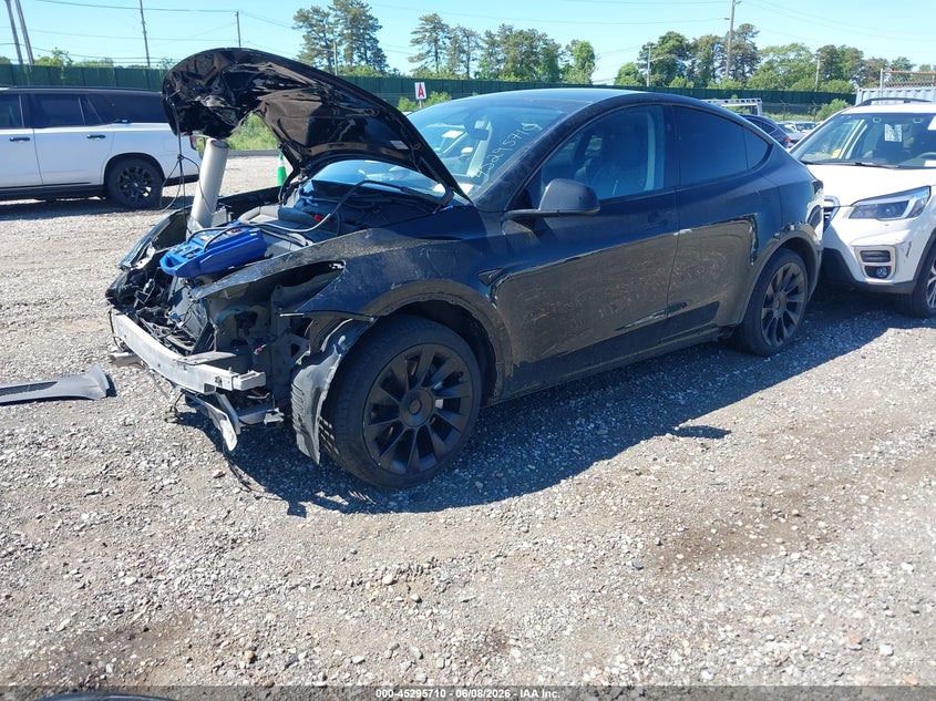 2023 Tesla Model y VIN 7SAYGDEE5PA179660 IAAI salvage auction — FRONT END, Salvage Title, sold $10,225 on 2026-07-16 (photo 2)