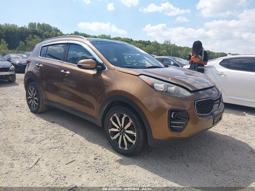 2017 Kia Sportage VIN KNDPNCAC1H7140393 IAAI salvage auction — ENGINE DAMAGE, Salvage Title, sold $2,400 on 2026-07-28 (photo 1)