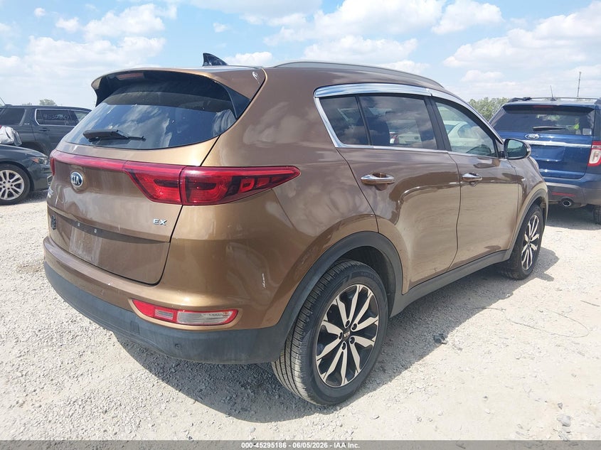 2017 Kia Sportage VIN KNDPNCAC1H7140393 IAAI salvage auction — ENGINE DAMAGE, Salvage Title, sold $2,400 on 2026-07-28 (photo 4)