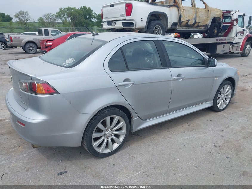2011 Mitsubishi Lancer VIN JA32U8FWXBU004347 IAAI salvage auction — NORMAL WEAR, Regular Certificate (Iowa), sold $650 on 2026-07-14 (photo 4)