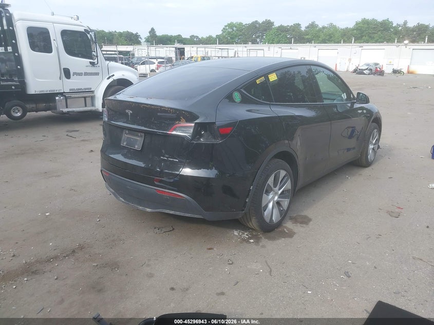 2023 Tesla Model y VIN 7SAYGDEE7PA176808 IAAI salvage auction — LEFT REAR, Salvage Title, sold $13,700 on 2026-07-09 (photo 4)
