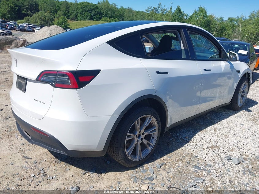 2023 Tesla Model y VIN 7SAYGDEE0PF698621 IAAI salvage auction — UNDERCARRIAGE, Salvage (New Hampshire), sold $25 on 2026-07-30 (photo 4)