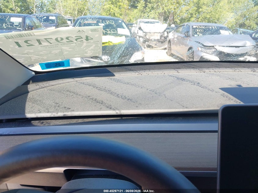 2023 Tesla Model y VIN 7SAYGDEE0PF698621 IAAI salvage auction — UNDERCARRIAGE, Salvage (New Hampshire), sold $25 on 2026-07-30 (photo 7)