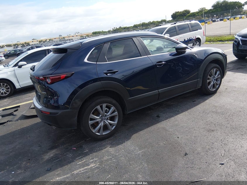 2025 Mazda Cx-30 VIN 3MVDMBCM0SM824336 IAAI salvage auction — LEFT SIDE, Rebuildable (Florida), sold $7,350 on 2026-08-20 (photo 4)