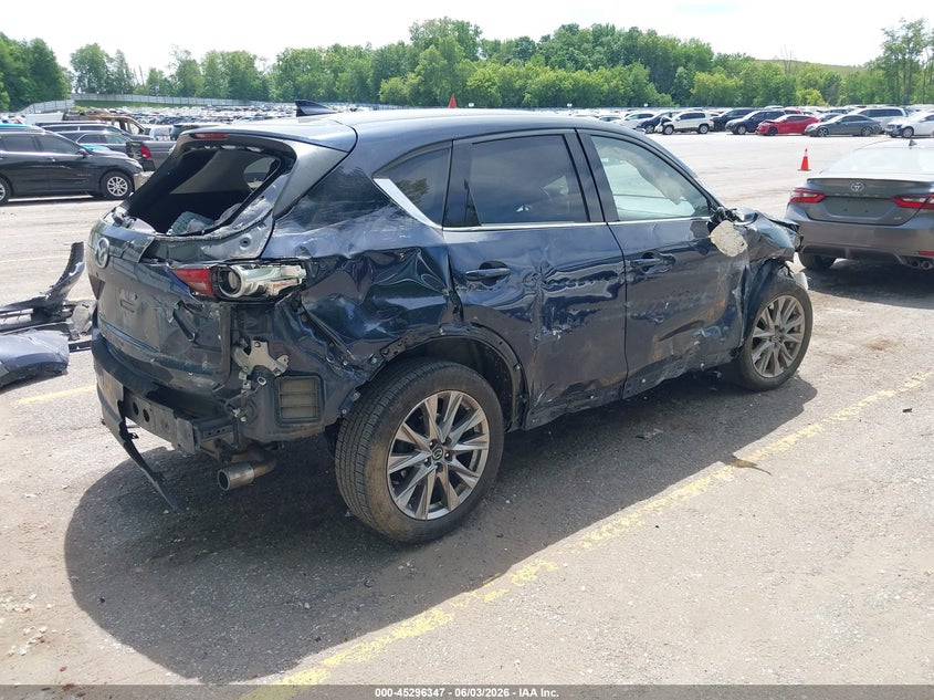 2021 Mazda Cx-5 VIN JM3KFBDM5M1394070 IAAI salvage auction — ALL OVER, Wait Title, sold $1,475 on 2026-09-14 (photo 4)