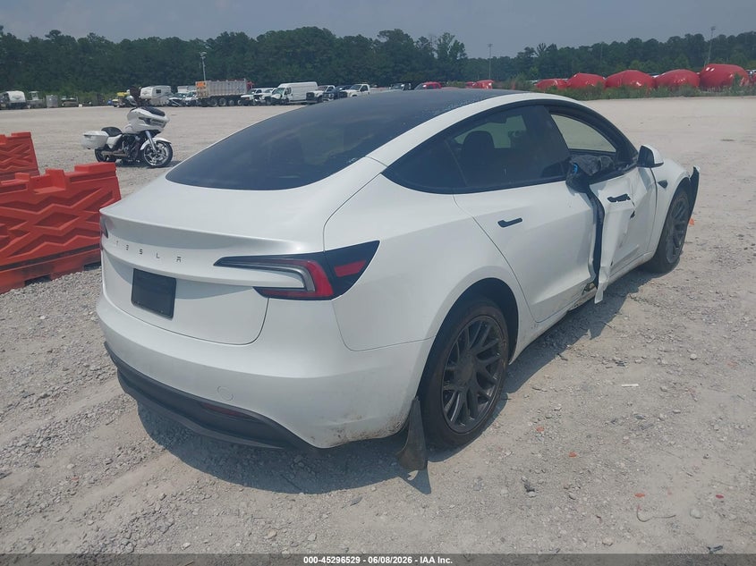 2025 Tesla Model 3 VIN 5YJ3E1EA6SF890000 IAAI salvage auction — SIDE, Salvage Title, sold $13,575 on 2026-07-21 (photo 4)