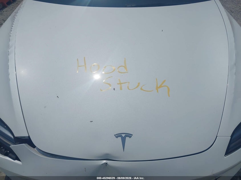 2025 Tesla Model 3 VIN 5YJ3E1EA6SF890000 IAAI salvage auction — SIDE, Salvage Title, sold $13,575 on 2026-07-21 (photo 7)