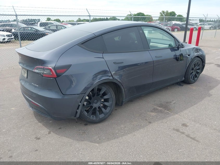 2021 Tesla Model y VIN 5YJYGDEE8MF267226 IAAI salvage auction — RIGHT SIDE, Salvage (Minnesota), sold $8,050 on 2026-08-27 (photo 4)