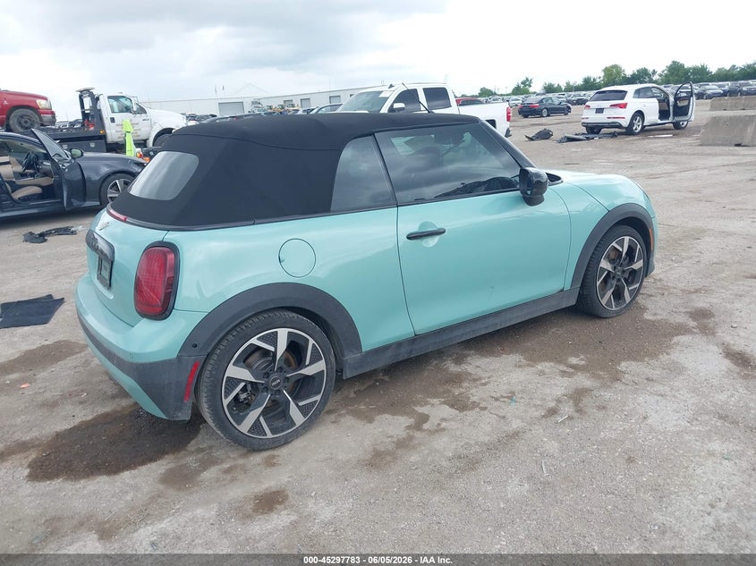 2026 Mini Convertible VIN WMW23GX09T2X74848 IAAI salvage auction — WATER/FLOOD, Salvage (Texas), sold $13,150 on 2026-08-12 (photo 4)