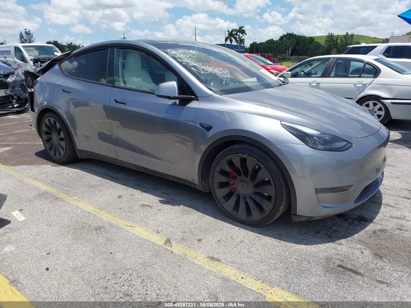 2024 Tesla Model y VIN 7SAYGDEF0RA306441 IAAI salvage auction — REAR END, Salvage Title, sold $12,875 on 2026-07-09 (photo 1)
