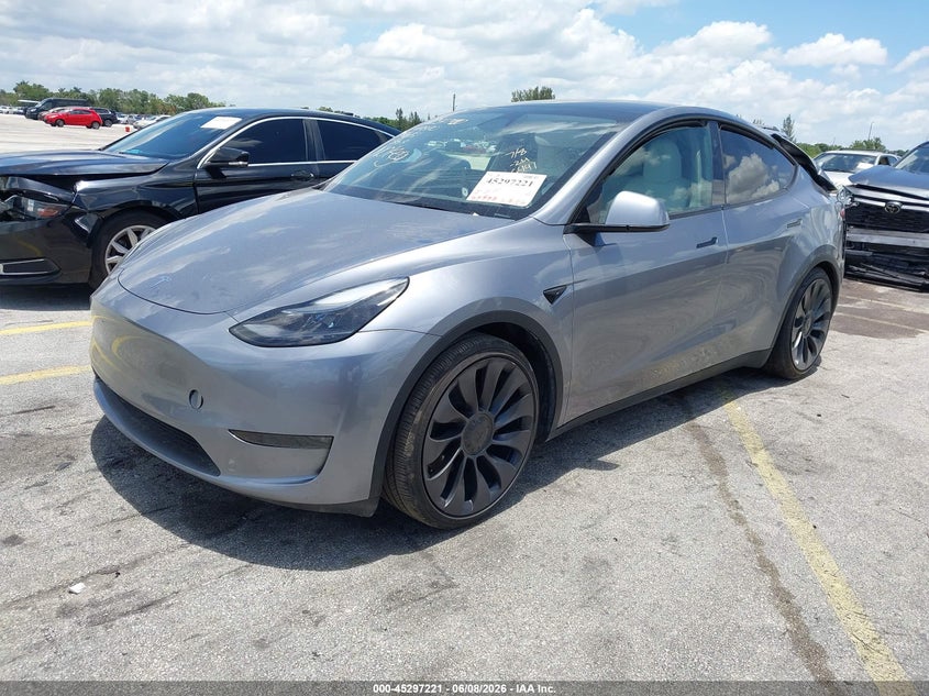 2024 Tesla Model y VIN 7SAYGDEF0RA306441 IAAI salvage auction — REAR END, Salvage Title, sold $12,875 on 2026-07-09 (photo 2)