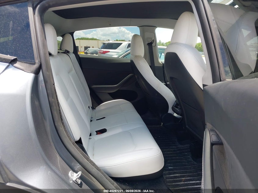 2024 Tesla Model y VIN 7SAYGDEF0RA306441 IAAI salvage auction — REAR END, Salvage Title, sold $12,875 on 2026-07-09 (photo 8)
