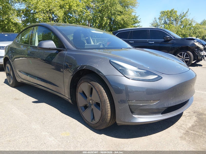 2023 Tesla Model 3 VIN 5YJ3E1EA2PF469351 IAAI salvage auction — RIGHT SIDE, Salvage (New Jersey), sold $9,700 on 2026-07-16 (photo 1)