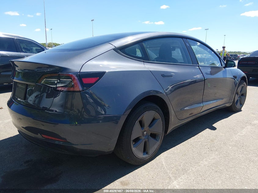 2023 Tesla Model 3 VIN 5YJ3E1EA2PF469351 IAAI salvage auction — RIGHT SIDE, Salvage (New Jersey), sold $9,700 on 2026-07-16 (photo 4)