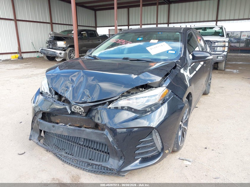 2019 Toyota Corolla VIN 5YFBURHE3KP948001 IAAI salvage auction — BIOHAZARD/CHEMICAL, Salvage Title, sold $2,800 on 2026-07-18 (photo 2)