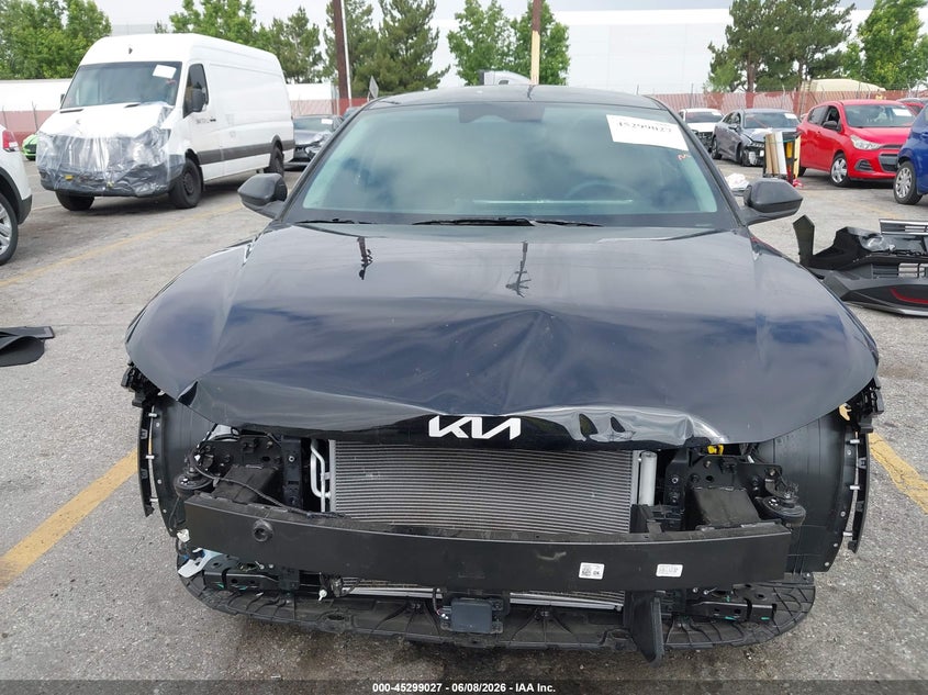 2026 Kia K4 VIN 3KPFT4DE6TE323754 IAAI salvage auction — FRONT & REAR, Salvage (California), sold $5,700 on 2026-07-29 (photo 6)