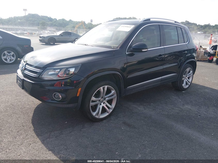 2016 Volkswagen Tiguan VIN WVGAV7AX8GW577081 IAAI salvage auction — LEFT SIDE, Salvage Title, sold $2,550 on 2026-07-21 (photo 2)