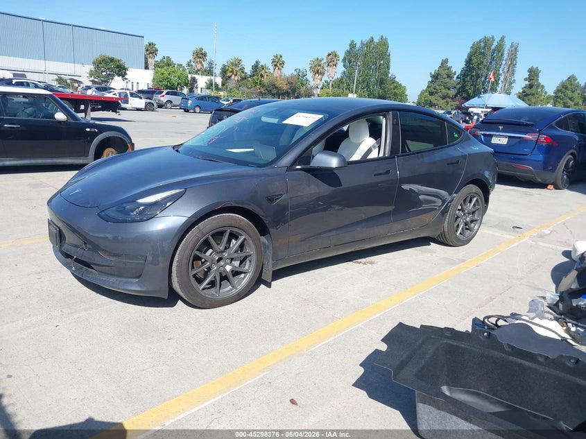 2022 Tesla Model 3 VIN 5YJ3E1EAXNF125599 IAAI salvage auction — REAR END, Salvage Title, sold $7,400 on 2026-07-13 (photo 2)