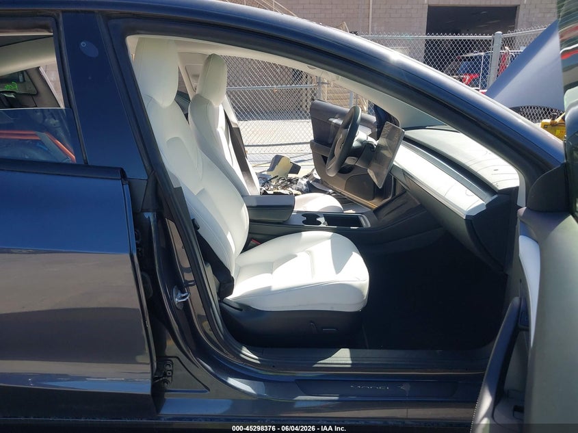 2022 Tesla Model 3 VIN 5YJ3E1EAXNF125599 IAAI salvage auction — REAR END, Salvage Title, sold $7,400 on 2026-07-13 (photo 5)