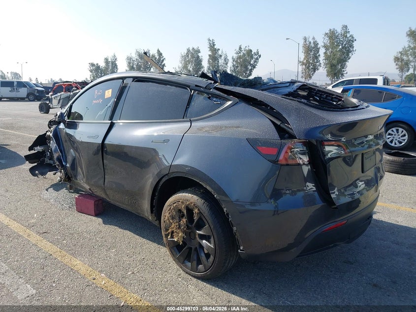 2024 Tesla Model y VIN 7SAYGDEE1RA233359 IAAI salvage auction — ROLLOVER, Salvage Title, sold $1,750 on 2026-07-21 (photo 3)