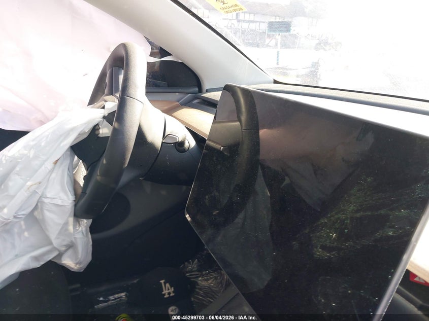 2024 Tesla Model y VIN 7SAYGDEE1RA233359 IAAI salvage auction — ROLLOVER, Salvage Title, sold $1,750 on 2026-07-21 (photo 7)