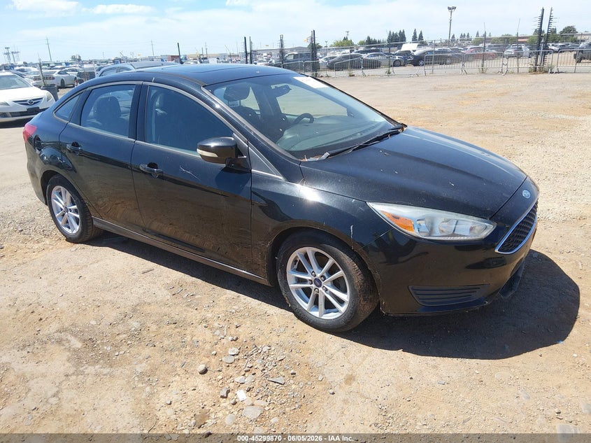 2015 Ford Focus VIN 1FADP3F23FL244035 IAAI salvage auction — NORMAL WEAR, Salvage Title, sold $400 on 2026-07-15 (photo 1)