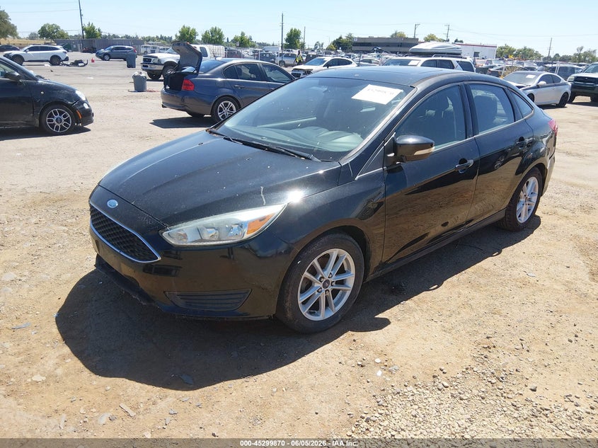 2015 Ford Focus VIN 1FADP3F23FL244035 IAAI salvage auction — NORMAL WEAR, Salvage Title, sold $400 on 2026-07-15 (photo 2)