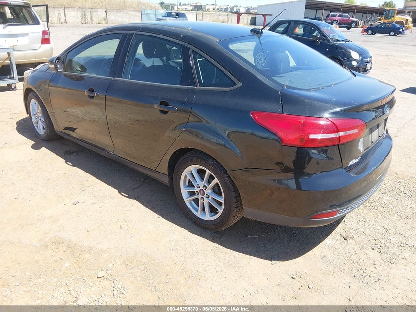 2015 Ford Focus VIN 1FADP3F23FL244035 IAAI salvage auction — NORMAL WEAR, Salvage Title, sold $400 on 2026-07-15 (photo 3)