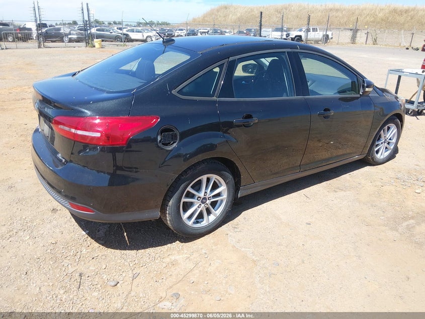 2015 Ford Focus VIN 1FADP3F23FL244035 IAAI salvage auction — NORMAL WEAR, Salvage Title, sold $400 on 2026-07-15 (photo 4)