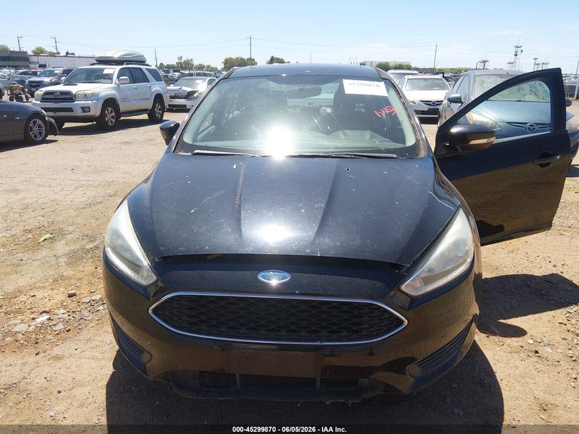 2015 Ford Focus VIN 1FADP3F23FL244035 IAAI salvage auction — NORMAL WEAR, Salvage Title, sold $400 on 2026-07-15 (photo 6)