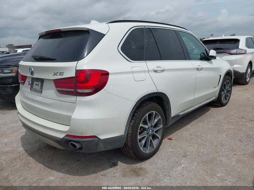 2014 BMW X5 VIN 5UXKS4C51E0J94397 IAAI salvage auction — NORMAL WEAR, Original (Texas), sold $5,550 on 2026-07-07 (photo 4)