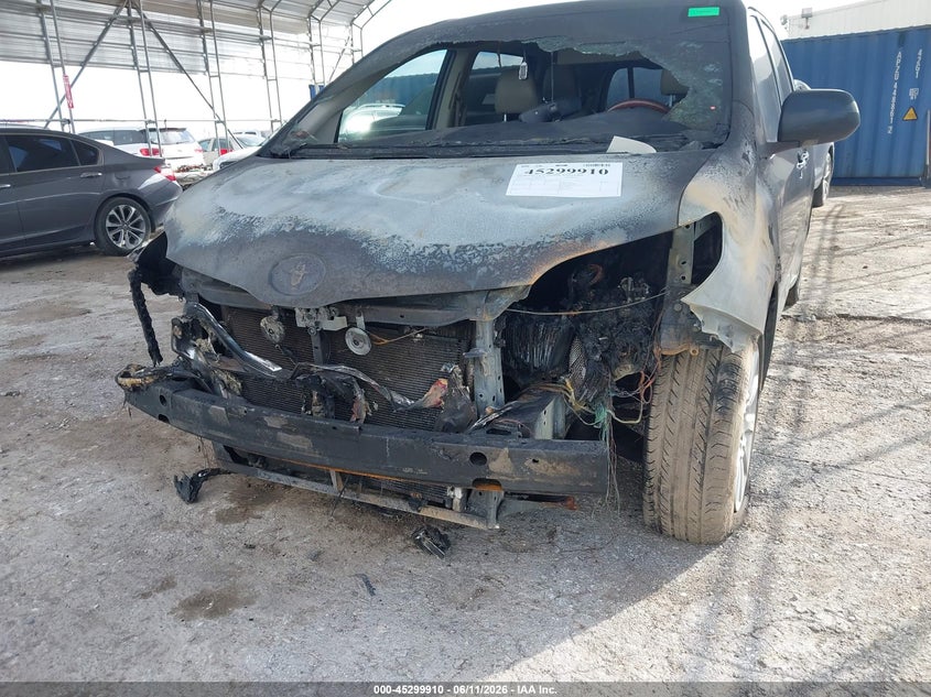 2011 Toyota Sienna VIN 5TDDK3DC5BS019371 IAAI salvage auction — ENGINE BURN, Salvage (Texas), sold $1,150 on 2026-07-13 (photo 6)