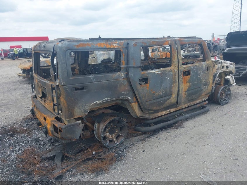 2004 Hummer H2 VIN 5GRGN23U24H113464 IAAI salvage auction — TOTAL BURN, Parts Only (Arkansas), sold $75 on 2026-07-29 (photo 4)