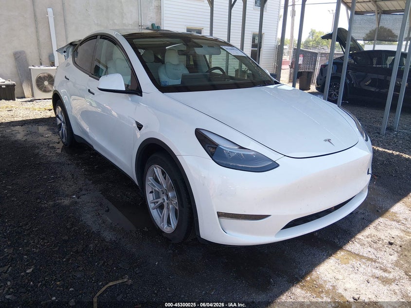 2023 Tesla Model y VIN 7SAYGDEE9PF632780 IAAI salvage auction — REAR END, Salvage Title, sold $11,025 on 2026-07-06 (photo 1)