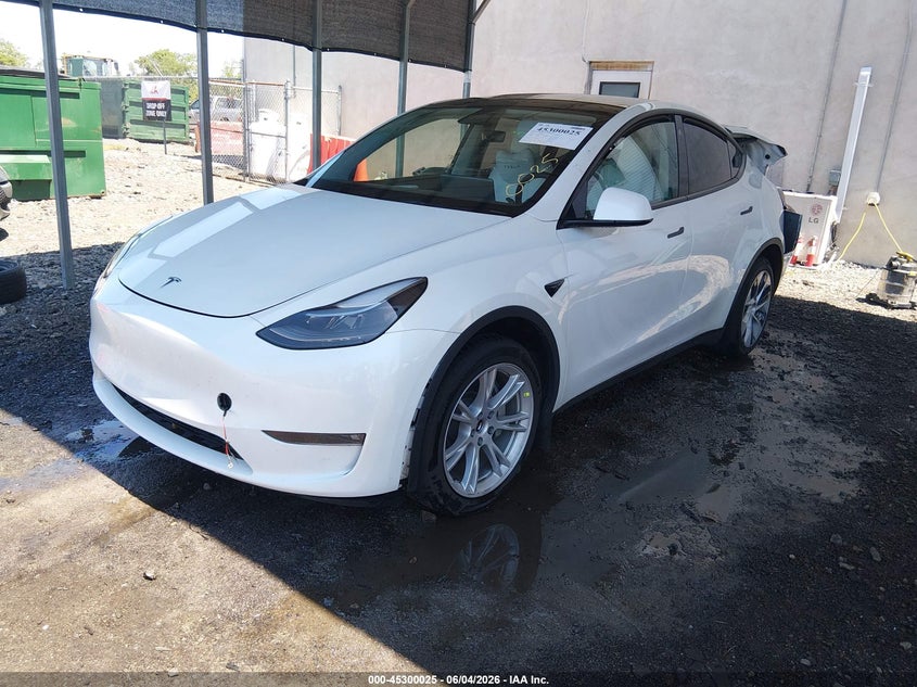 2023 Tesla Model y VIN 7SAYGDEE9PF632780 IAAI salvage auction — REAR END, Salvage Title, sold $11,025 on 2026-07-06 (photo 2)