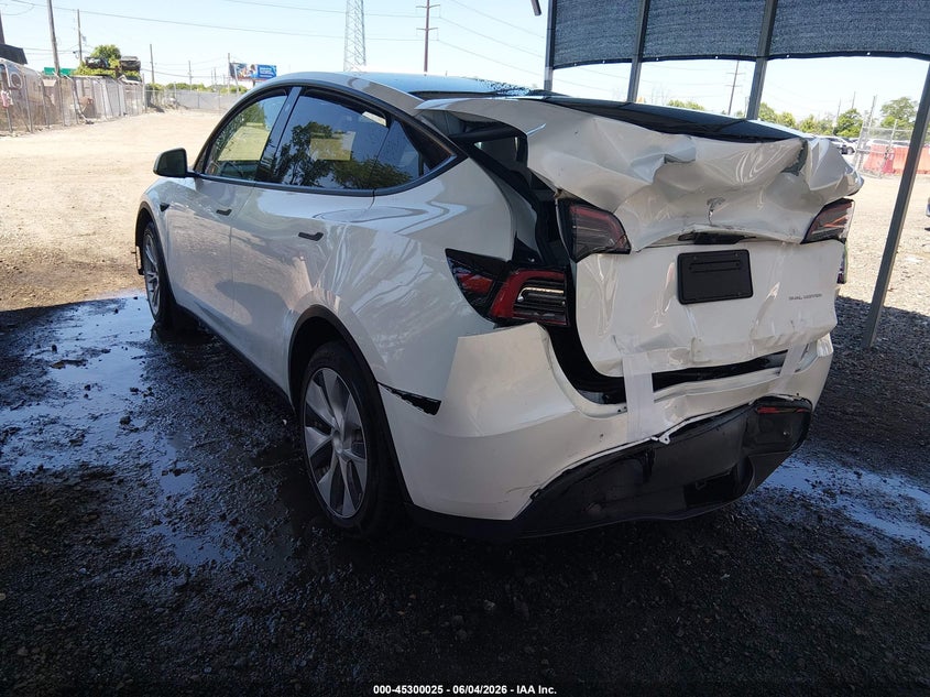 2023 Tesla Model y VIN 7SAYGDEE9PF632780 IAAI salvage auction — REAR END, Salvage Title, sold $11,025 on 2026-07-06 (photo 3)