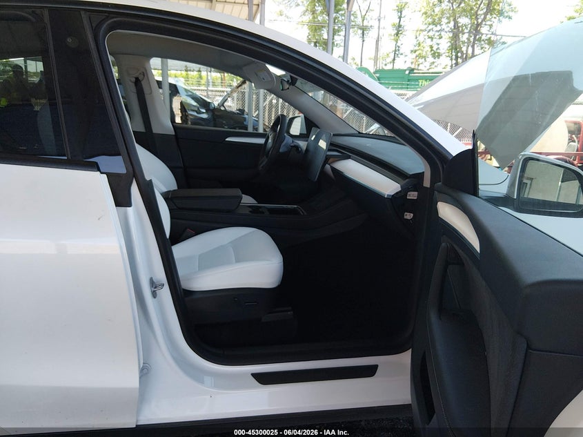 2023 Tesla Model y VIN 7SAYGDEE9PF632780 IAAI salvage auction — REAR END, Salvage Title, sold $11,025 on 2026-07-06 (photo 5)