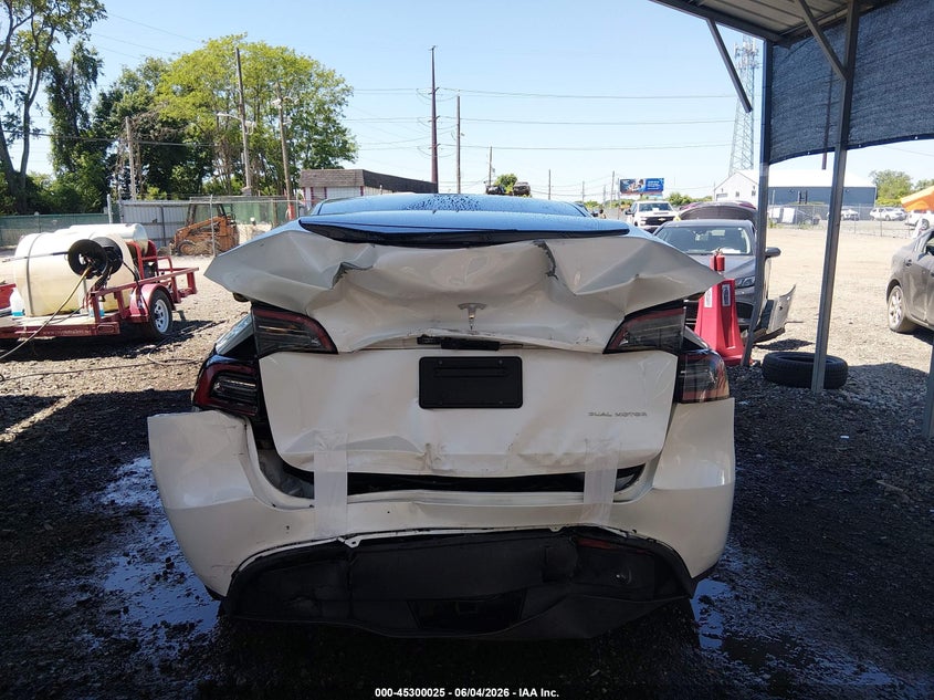 2023 Tesla Model y VIN 7SAYGDEE9PF632780 IAAI salvage auction — REAR END, Salvage Title, sold $11,025 on 2026-07-06 (photo 6)