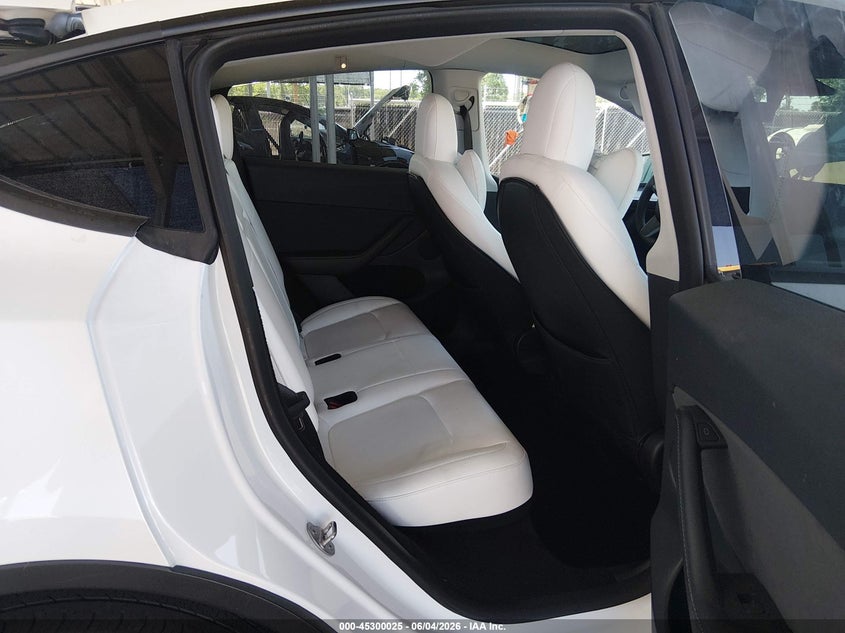 2023 Tesla Model y VIN 7SAYGDEE9PF632780 IAAI salvage auction — REAR END, Salvage Title, sold $11,025 on 2026-07-06 (photo 8)